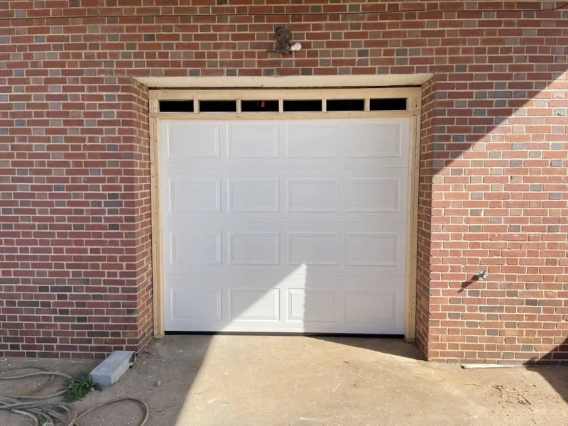 After: fresh white door in a newly framed opening